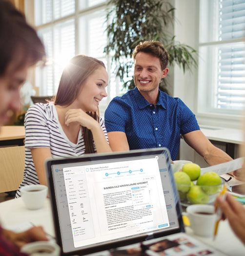 Team reviewing and signing a business agreement through DociShield's governed workflow